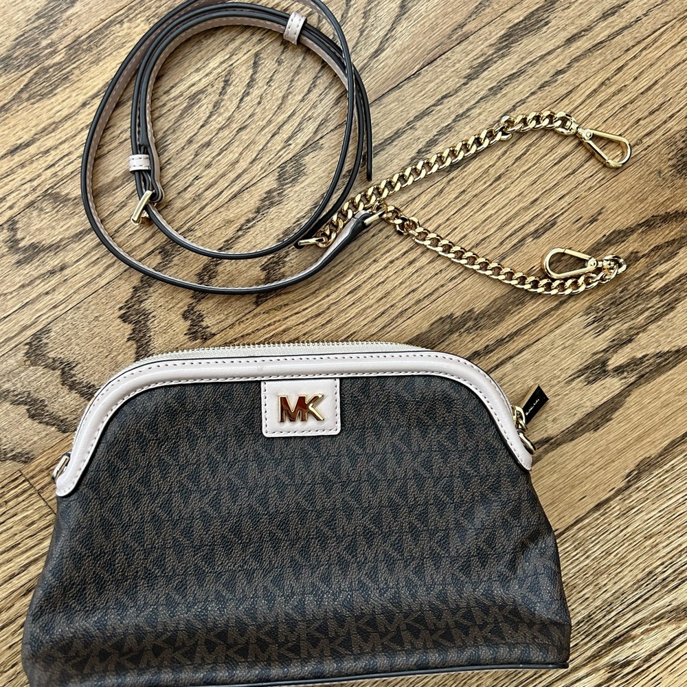 Michael Kors Black and Cream Purse with Gold strap.
